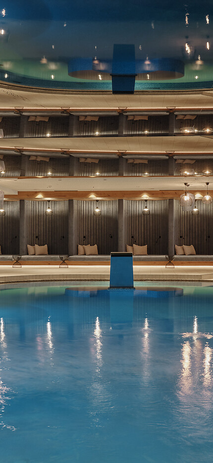 Modern indoor pool & indoor pool for families, children with sun loungers in the family spa