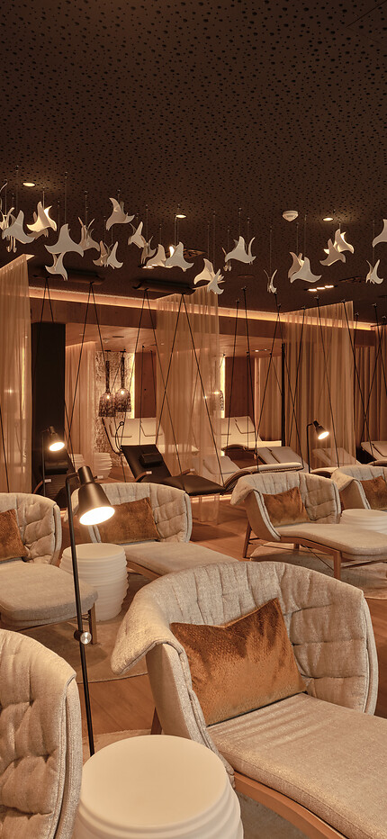 Relaxation room in the Adults Only area hotel grossarl with floating loungers and wooden features